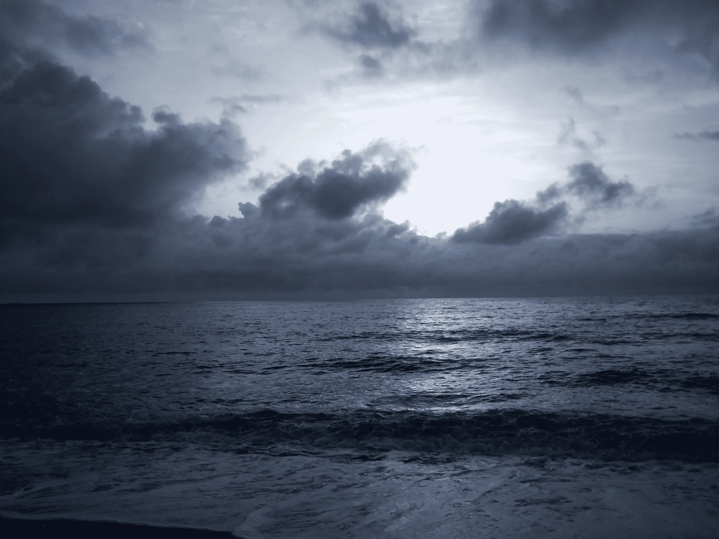 Sea under a heavy sky, port and marine tender scenario
